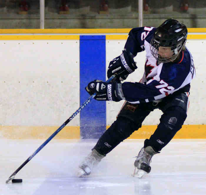hockey player doing an abrupt stop
